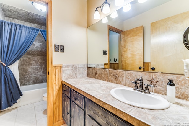 full bathroom with vanity, toilet, tile patterned flooring, and shower / bath combo