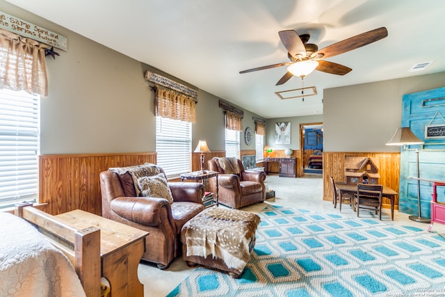 living room with carpet floors, a healthy amount of sunlight, and ceiling fan