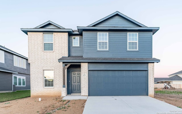 view of property featuring a garage