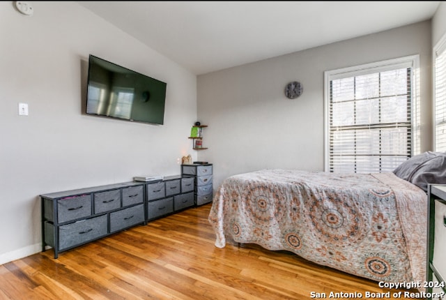 bedroom featuring hardwood / wood-style flooring