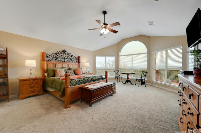 carpeted bedroom featuring vaulted ceiling and ceiling fan