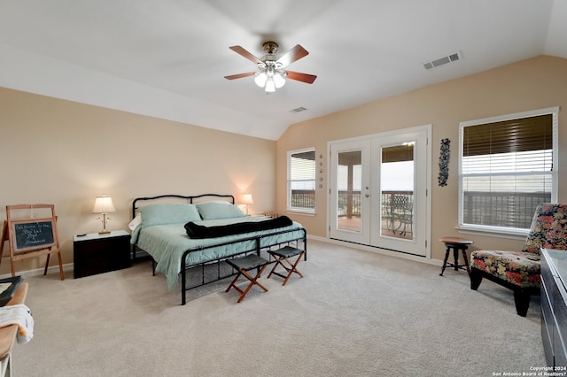 carpeted bedroom featuring french doors, lofted ceiling, access to exterior, and ceiling fan