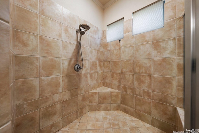 bathroom with tiled shower