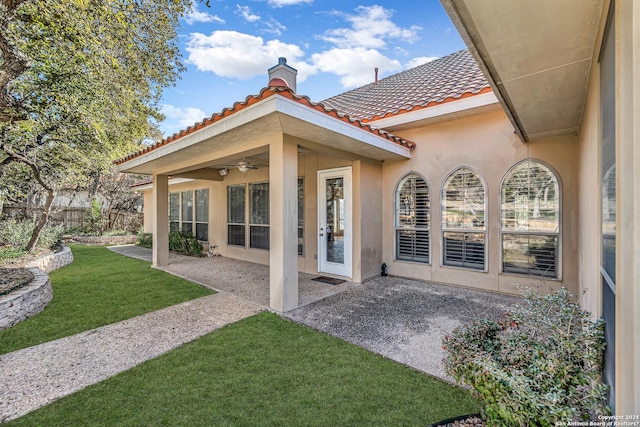 view of patio / terrace featuring a ceiling fan and fence