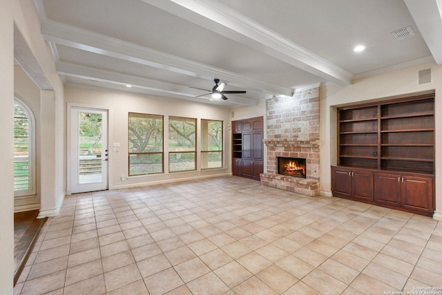 unfurnished living room featuring visible vents, a large fireplace, ceiling fan, beamed ceiling, and light tile patterned floors