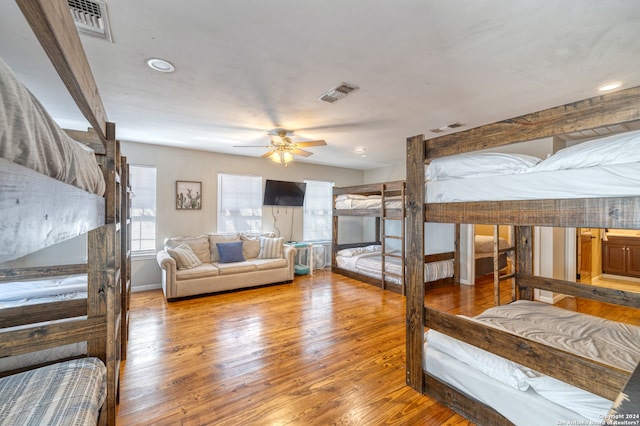 bedroom featuring hardwood / wood-style flooring and ceiling fan