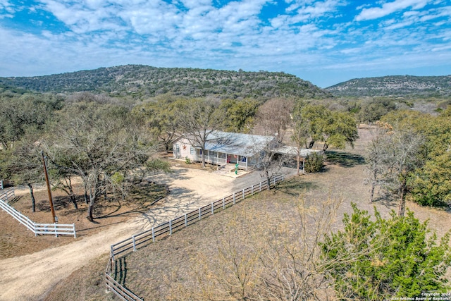 birds eye view of property with a rural view and a mountain view