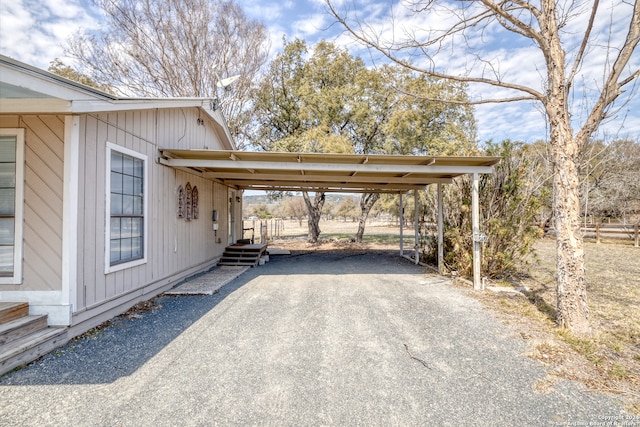 view of parking featuring a carport