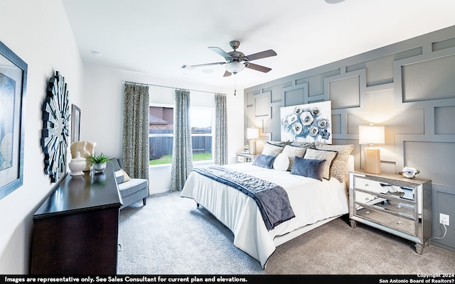 bedroom with light carpet and ceiling fan