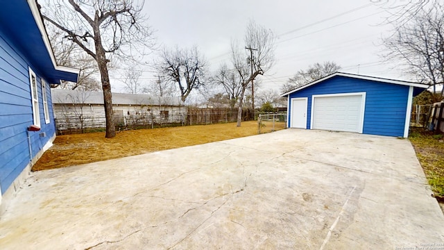 garage with a yard