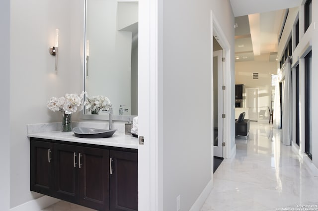 interior space featuring light tile floors and sink