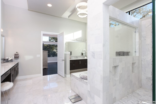 bathroom with vanity, plus walk in shower, tile floors, and a chandelier