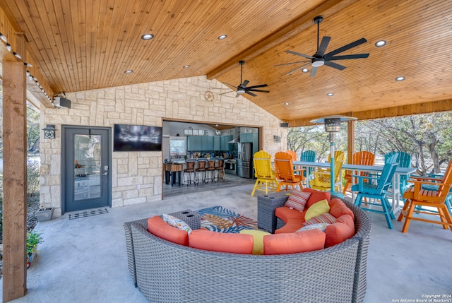 exterior space with ceiling fan