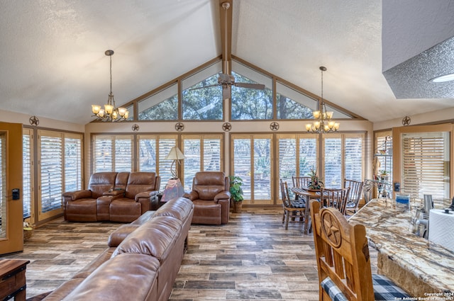 living room featuring a chandelier, high vaulted ceiling, beam ceiling, a textured ceiling, and dark wood-type flooring