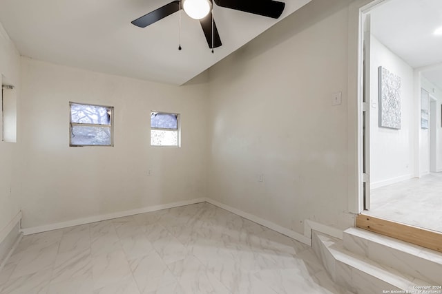 empty room featuring ceiling fan