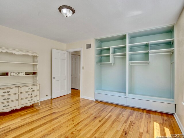 unfurnished bedroom with light hardwood / wood-style floors