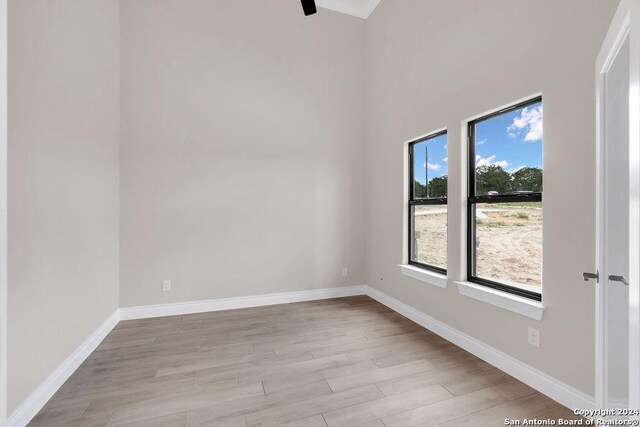 unfurnished room featuring light wood-type flooring