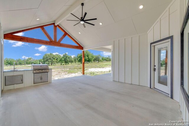 view of patio / terrace featuring area for grilling, ceiling fan, and a grill