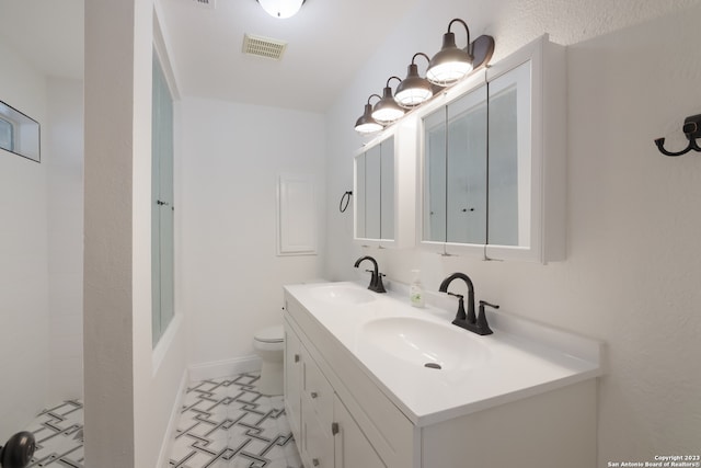126 Lucas St, San Antonio, TX 78209 - full bath featuring double vanity, visible vents, a shower, and a sink