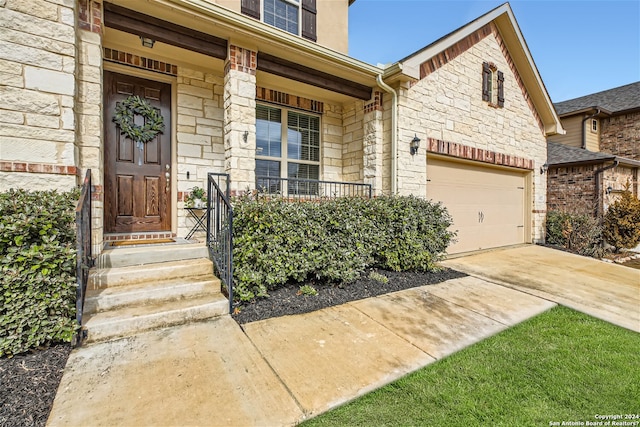 view of front facade featuring covered porch and a garage