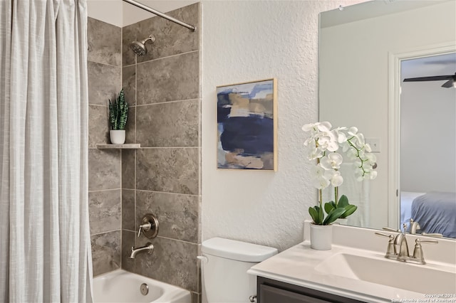 full bathroom with oversized vanity, toilet, ceiling fan, and shower / bathtub combination with curtain