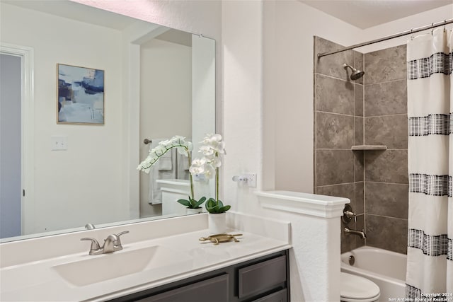 full bathroom featuring toilet, shower / bathtub combination with curtain, and vanity