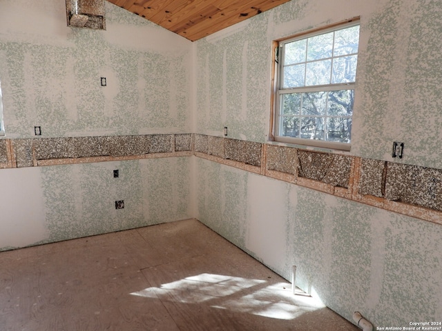 bathroom featuring wooden ceiling and lofted ceiling