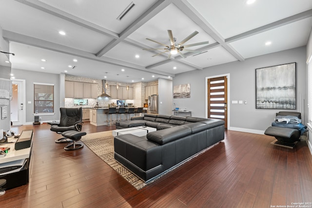 living room with beam ceiling, coffered ceiling, ceiling fan, and hardwood / wood-style flooring