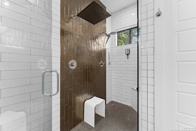 bathroom featuring an enclosed shower