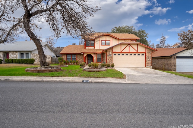 12318 Autumn Vista St, San Antonio, TX 78249 - tudor-style house with a front lawn
