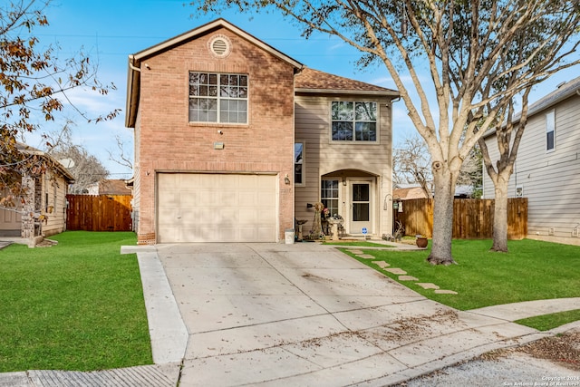 view of front property with a garage and a front lawn