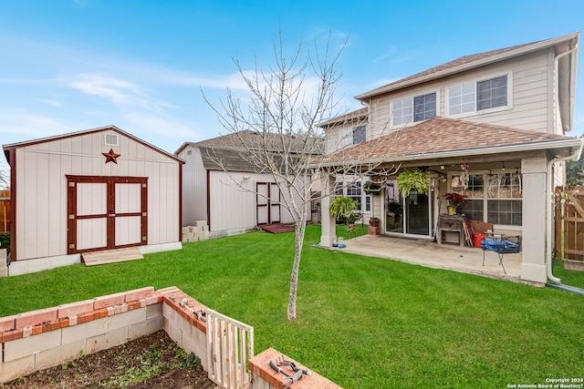 view of yard featuring a storage shed and a patio