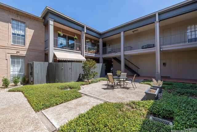 view of home's community featuring a patio