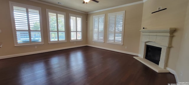 unfurnished living room with crown molding, dark hardwood / wood-style floors, and ceiling fan