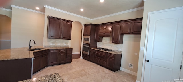 kitchen featuring crown molding, sink, tasteful backsplash, and stainless steel appliances