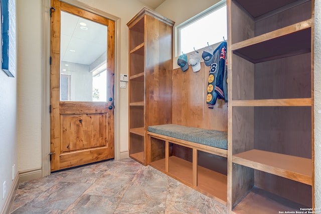 mudroom with light tile flooring