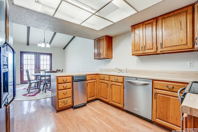 kitchen with lofted ceiling with beams, kitchen peninsula, dishwasher, and light hardwood / wood-style flooring