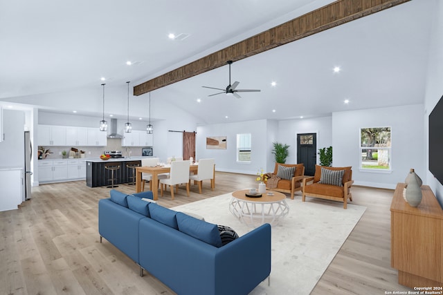 living room featuring high vaulted ceiling, ceiling fan, light wood-type flooring, and beamed ceiling