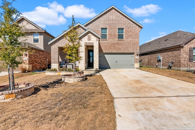 front facade with a garage