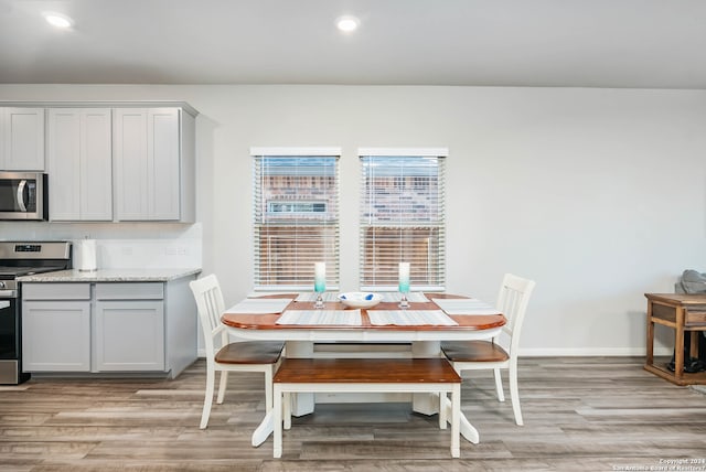 dining room with light wood-type flooring