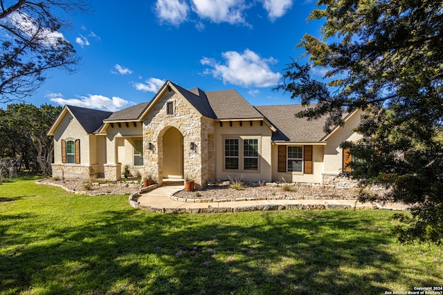 view of front of house with a front lawn