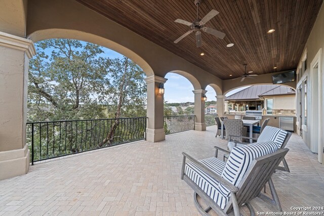 view of patio / terrace with ceiling fan