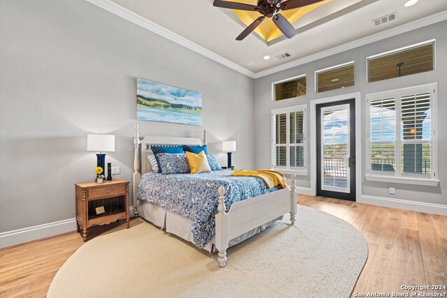 bedroom featuring access to exterior, ceiling fan, light hardwood / wood-style flooring, and crown molding