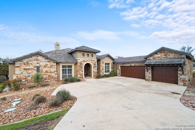 view of front of property with a garage