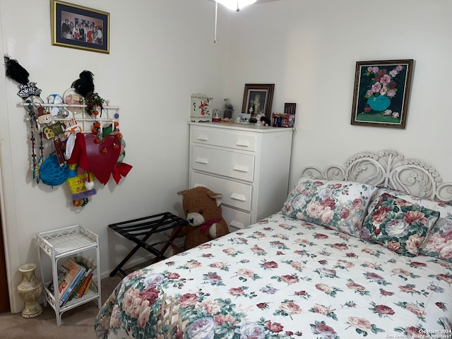 bedroom featuring carpet