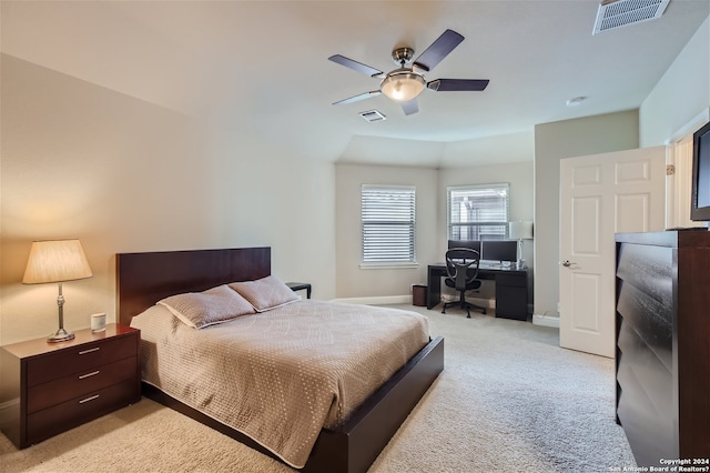 bedroom featuring light colored carpet and ceiling fan