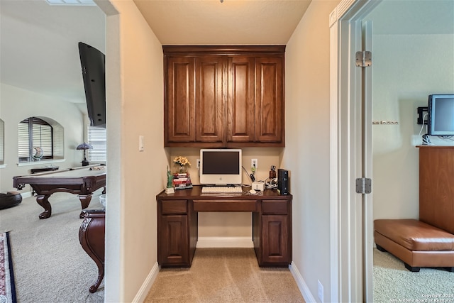 home office with pool table and light colored carpet