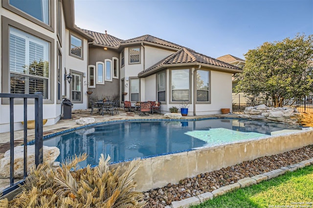 view of pool with a patio