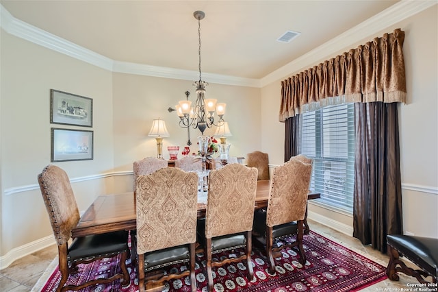 tiled dining area featuring ornamental molding and a notable chandelier