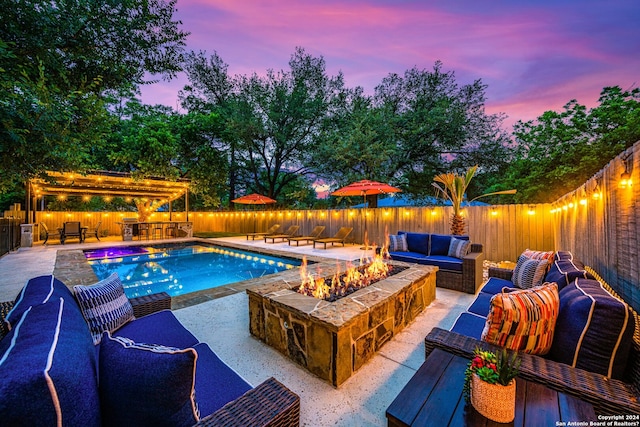 pool at dusk with outdoor lounge area and a patio